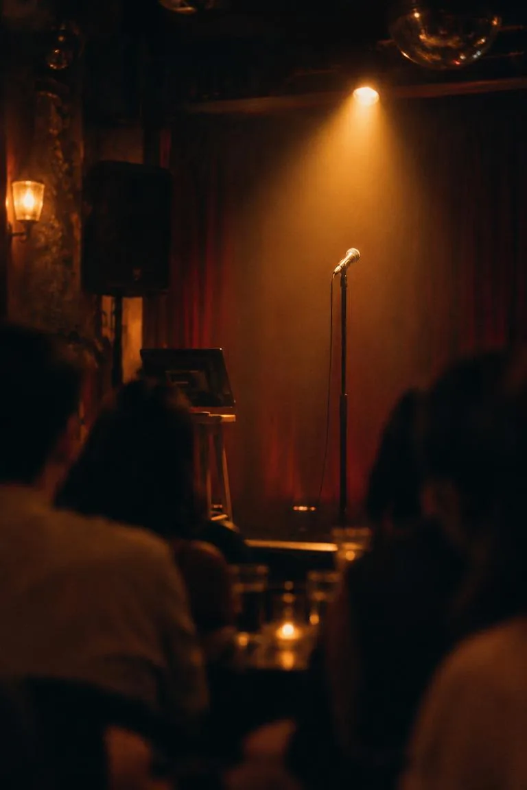 Small karaoke stage with a microphone in a warm spotlight