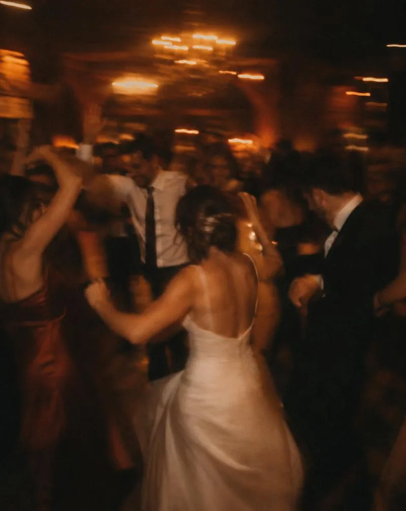 Wedding guests dancing on the reception floor